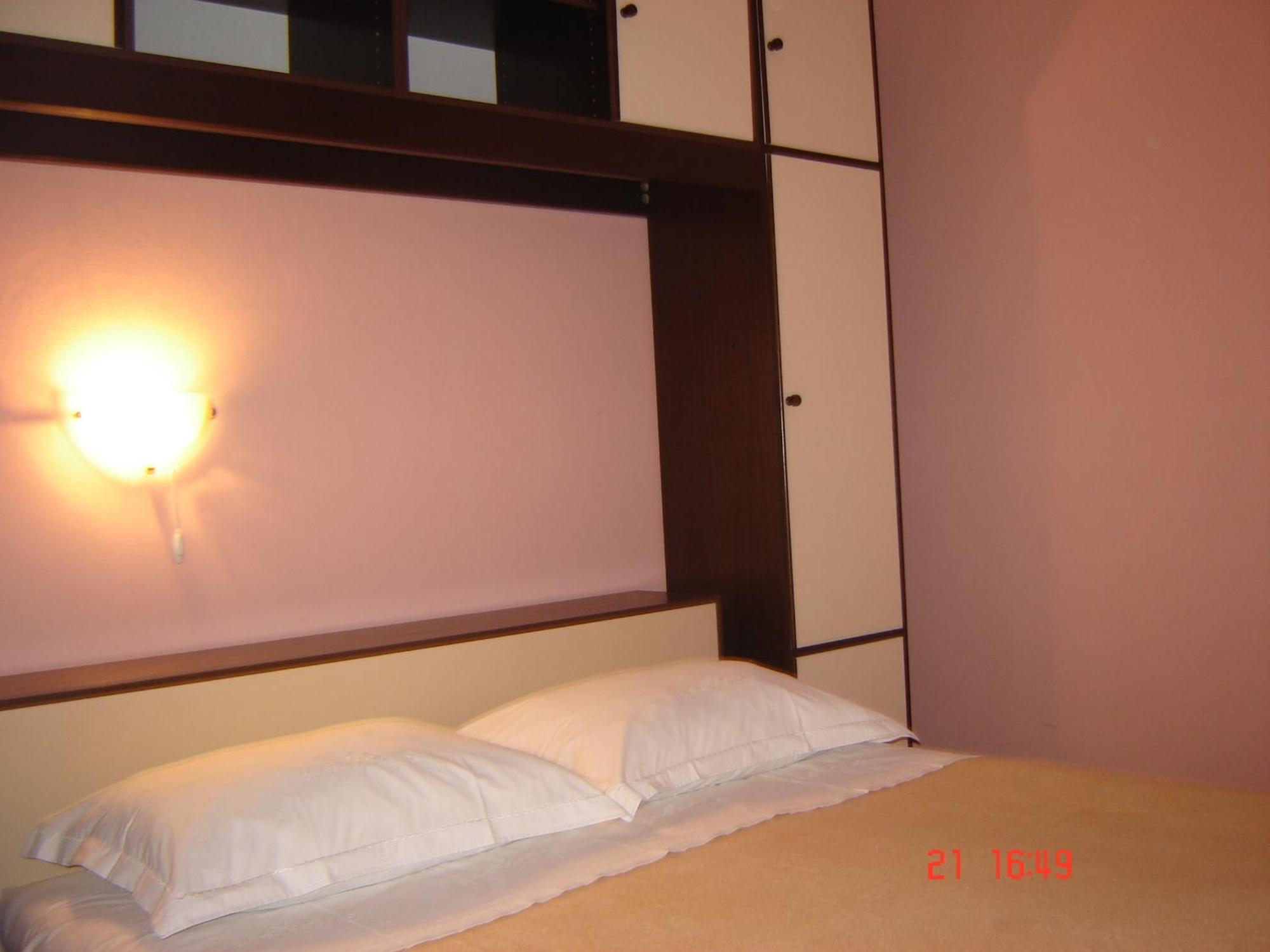 Apartments & Rooms Brna Banjol Quarto foto